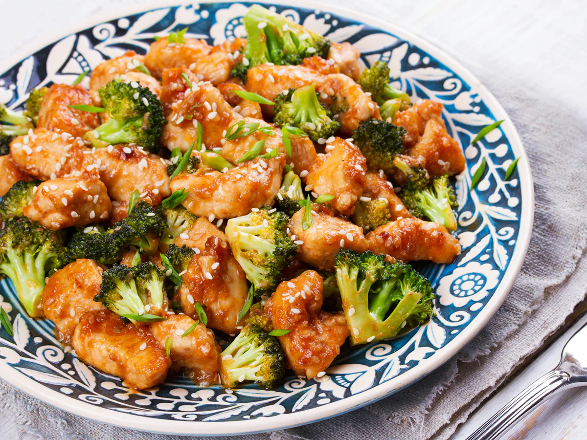 Glazed sesame chicken stir-fried with crisp broccoli florets at Lee's Garden, a Chinese Restaurant in Rosenberg
